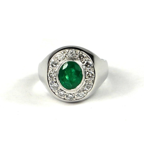 2 - AN 18CT WHITE GOLD, OVAL EMERALD AND DIAMOND CLUSTER RING
with original WGI certificate.
(oval emera... 