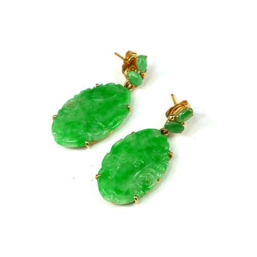 3 - A PAIR OF 18CT GOLD AND JADE DROP EARRINGS 
Having a carved and partial pierced decoration to jade.
... 