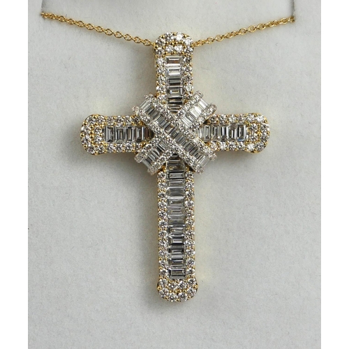 36 - A LARGE 18CT GOLD, BAGUETTE AND ROUND BRILLIANT CUT DIAMOND CROSS
Boxed.
(diamonds 2.80ct, rd 1.36ct... 