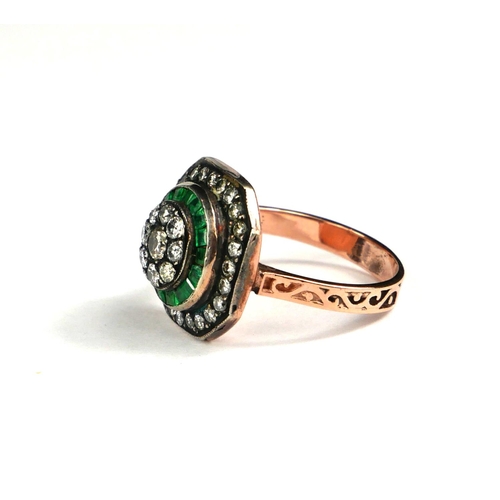 60 - A VINTAGE STYLE 8CT ROSE GOLD, ROUND BRILLIANT CUT DIAMOND AND STEP CUT NATURAL EMERALD SQUARE RING
... 