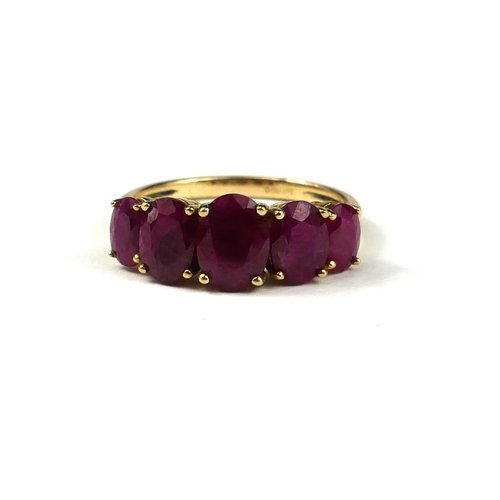 78 - A 9CT GOLD FIVE STONE BURMESE RUBY RING.
(approx weight 1.5ct, gross weight 3.6g, size Q½)