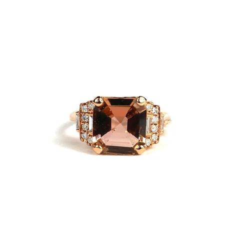 77A - AN 18CT ROSE GOLD RING set with octagonal step cut tourmaline and round brilliant cut and baguette c... 