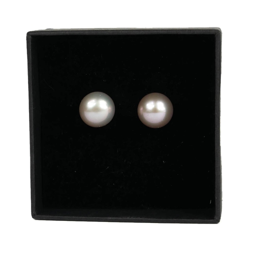 91A - A PAIR OF 9CT YELLOW GOLD SILVER/PINK FRESHWATER CULTURED PEARL STUDS.  Boxed