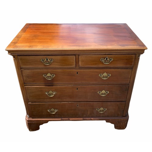 238 - AN 18TH CENTURY GEORGE III MAHOGANY CHEST 
Of two short over three long graduated drawers flanked by... 