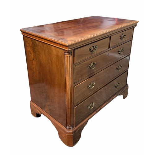 238 - AN 18TH CENTURY GEORGE III MAHOGANY CHEST 
Of two short over three long graduated drawers flanked by... 