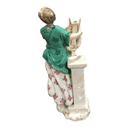 155 - TWO 19TH CENTURY PORCELAIN FIGURES
To include a lady holding a painter's pallet with an oval canvas ... 