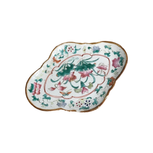 138 - A 19TH CENTURY CHINESE FAMILLE ROSE RAISED DISH
Decorated with flowers and foliage. 
(h 4.9cm x w 21... 