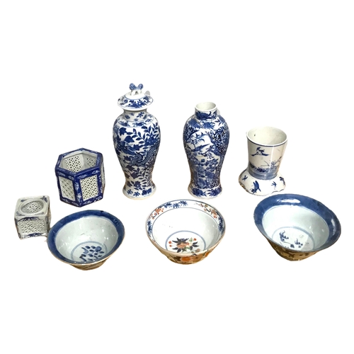 140 - A COLLECTION OF EIGHT CHINESE BLUE AND WHITE PORCELAIN BOWLS, VASES AND POTS
To include a blue and w... 