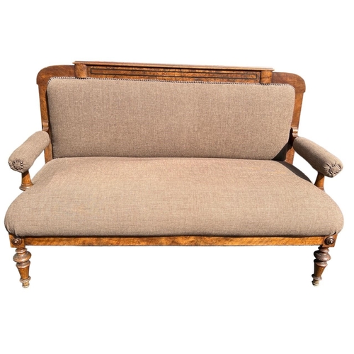 223 - A 19TH CENTURY CONTINENTAL WALNUT UPHOLSTERED SETTEE
Raised on turned legs.
(h 101cm x d 66cm x w 15... 