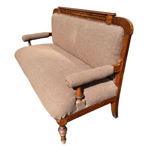 223 - A 19TH CENTURY CONTINENTAL WALNUT UPHOLSTERED SETTEE
Raised on turned legs.
(h 101cm x d 66cm x w 15... 