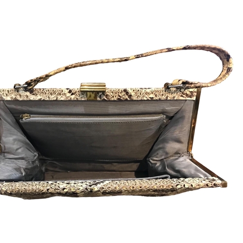 101 - TWO VINTAGE SNAKESKIN HANDBAGS.
((largest h 35cm x w 26.5cm x depth 7cm)