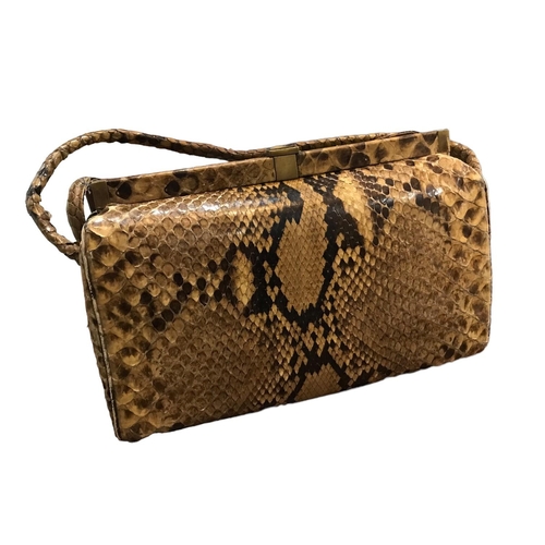 101 - TWO VINTAGE SNAKESKIN HANDBAGS.
((largest h 35cm x w 26.5cm x depth 7cm)