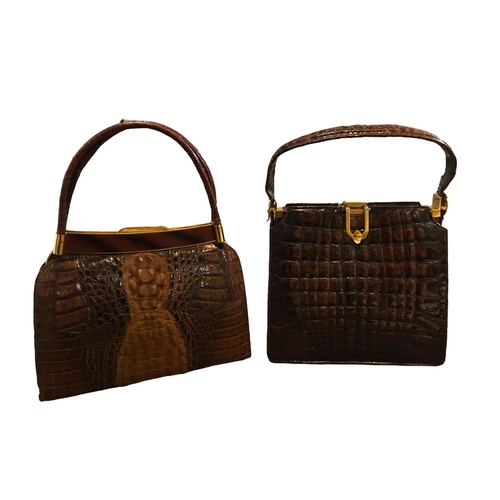 102 - TWO VINTAGE CROCODILE SKIN HANDBAGS.
(largest h 36cm x w 25cm x depth 7cm)