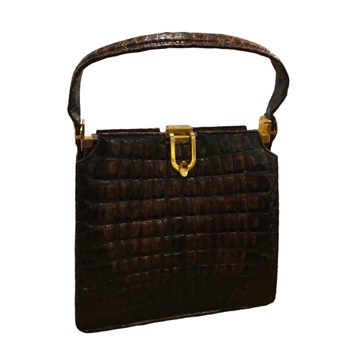 102 - TWO VINTAGE CROCODILE SKIN HANDBAGS.
(largest h 36cm x w 25cm x depth 7cm)