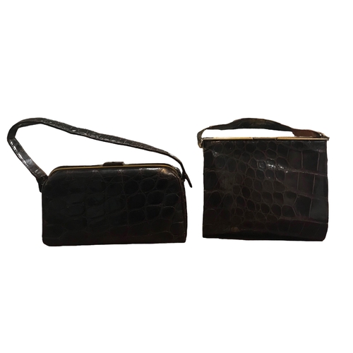 104 - TWO VINTAGE CROCODILE SKIN HANDBAGS.
(largest h 23.5cm x w 23cm x depth 7cm)