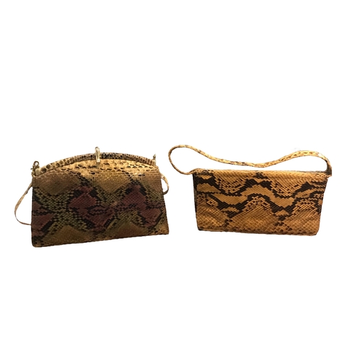 107 - TWO VINTAGE SNAKESKIN CLUTCH BAGS.
(largest h 17cm x w 23cm x depth 4cm)