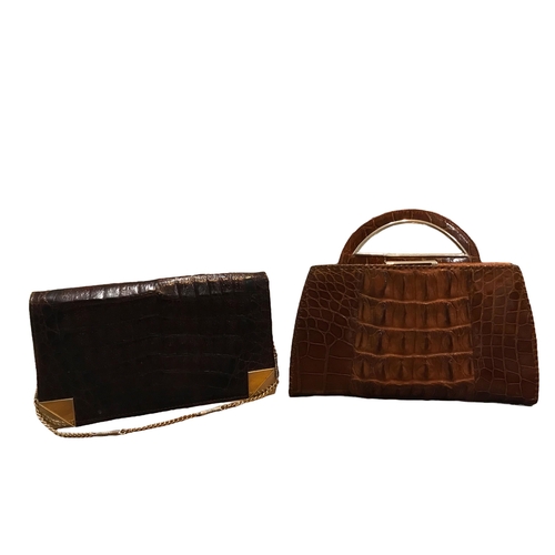 117 - TWO VINTAGE CROCODILE SKIN CLUTCH BAGS.
(larges h 20cm x w 25cm x depth 3cm)