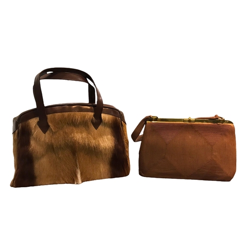 119 - CORDÉ, A VINTAGE FABRIC HANDBAG
Together with a vintage Lysta rabbit fur handbag.
(largest h 34cm x ... 