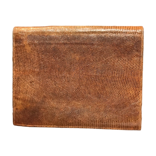 120a - A VINTAGE SNAKESKIN LEATHER CLUTCH BAG.
(24.5cm x 19.5cm)