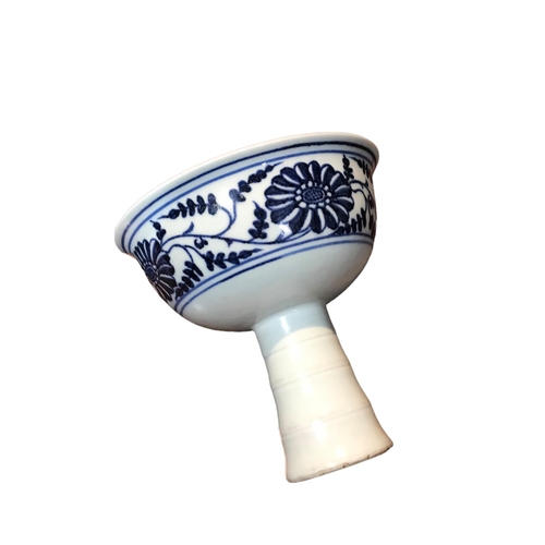 127 - A CHINESE BLUE AND WHITE STEM CUP 
Decorated interior showing a dragon chasing the pearl of wisdom, ... 