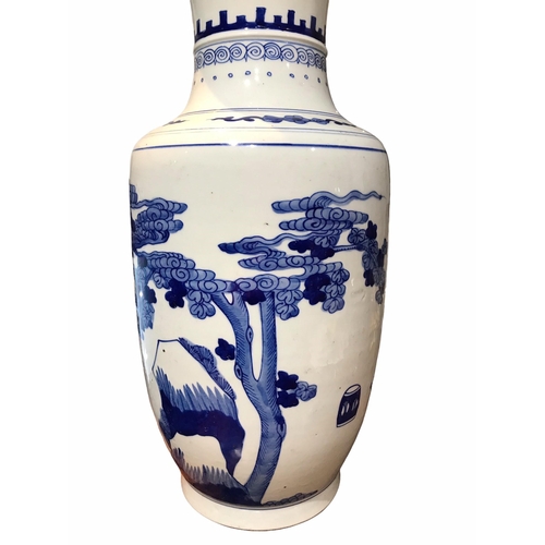 130 - A LARGE CHINESE BLUE AND WHITE BANGCHUIPING/ROULEAU SHAPED VASE
Decorated with an interior scene wit... 