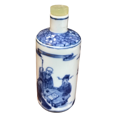 137 - A CHINESE BLUE AND WHITE PORCELAIN CYLINDRICAL SCENT BOTTLE
Having a jade top stopper, decorated wit... 