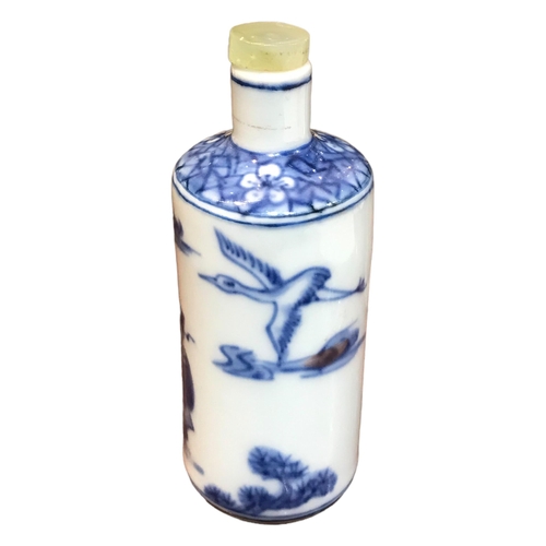 137 - A CHINESE BLUE AND WHITE PORCELAIN CYLINDRICAL SCENT BOTTLE
Having a jade top stopper, decorated wit... 