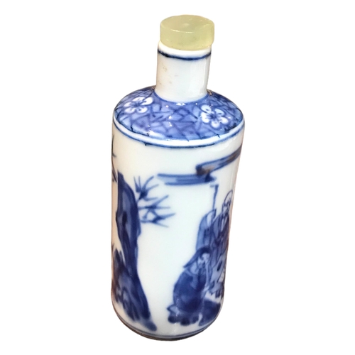 137 - A CHINESE BLUE AND WHITE PORCELAIN CYLINDRICAL SCENT BOTTLE
Having a jade top stopper, decorated wit... 