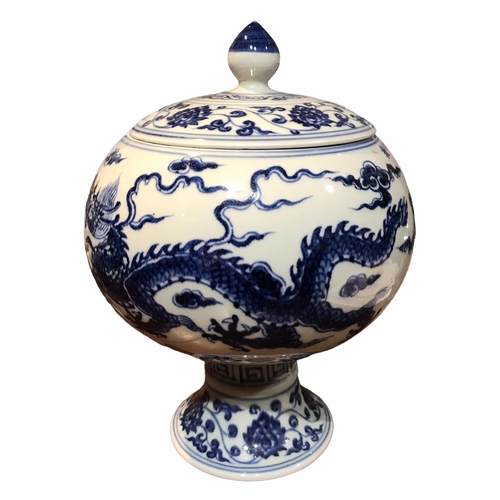 143 - A CHINESE BLUE AND WHITE RAISED LIDDED VESSEL, GINGER JAR AND SMALL POT
Lidded vessel decorated with... 