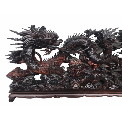 145 - A LARGE CHINESE CARVED HARDWOOD DEPICTING A DRAGON, PEACOCK, FO DOG AND
LÓNGGUĪ DRAGON TORTOISE.
(h ... 