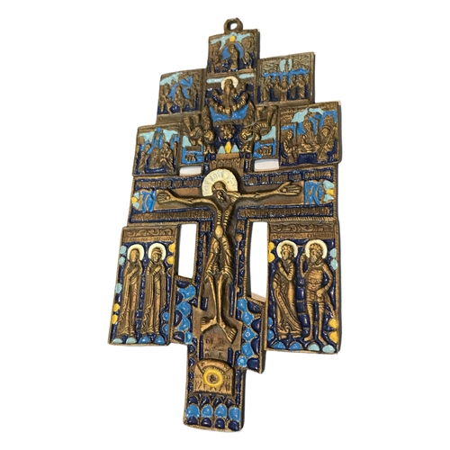 179 - A 19TH CENTURY RUSSIAN BRASS AND ENAMEL CRUCIFIX ICON
Bearing inscription verso. 
(19.1cm x 9.3cm)