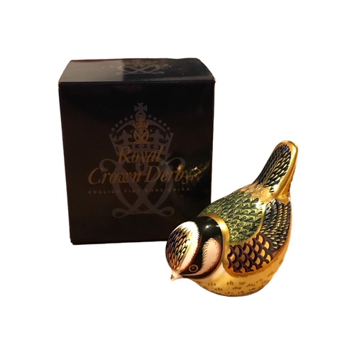 184 - ROYAL CROWN DERBY, A GOLD BUTTONED BLUE TIT BIRD 
In original box. 
(h 7.3cm x w 9.5cm x depth 5.4cm... 