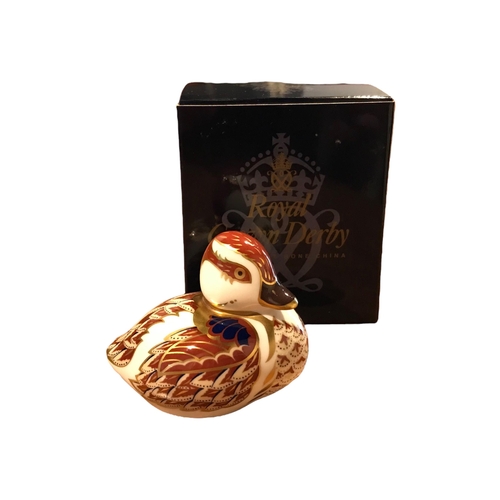 186 - ROYAL CROWN DERBY GOLD, A BUTTONED SWIMMING DUCKLING 
In original box. 
(h 6cm x w 7.5cm x depth 5.4... 