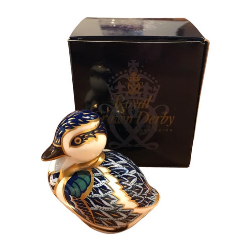 188 - ROYAL CROWN DERBY, A GOLD BUTTONED SWIMMING DUCKLING
In original box. 
(h 7cm x w 7cm x depth 4.5cm)