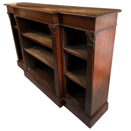 216 - A WILLIAM IV DESIGN CARVED MAHOGANY FLOORSTANDING BREAKFRONT BOOKCASE
With adjustable shelves, raise... 