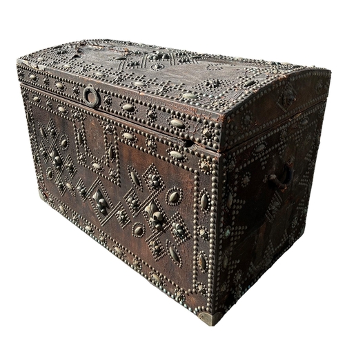 218 - A 17TH CENTURY FRENCH (POSSIBLY ROYAL FAMILY) LEATHER AND BRASS TRUNK
Decorative with Fleur-de-Lis a... 