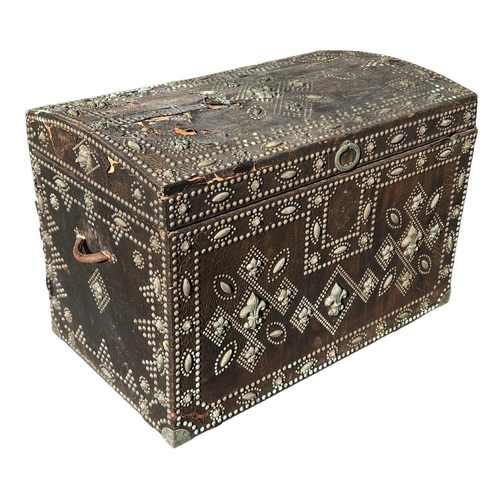 218 - A 17TH CENTURY FRENCH (POSSIBLY ROYAL FAMILY) LEATHER AND BRASS TRUNK
Decorative with Fleur-de-Lis a... 