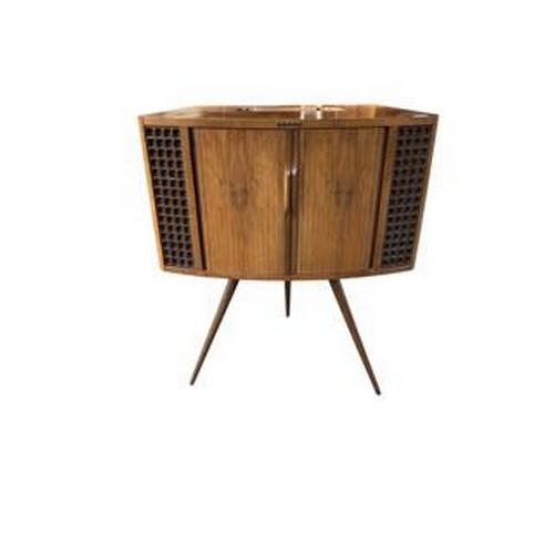 220 - DECCA, A MID 20TH CENTURY WALNUT TV CABINET 
With tambour front sliding doors raised on three turned... 