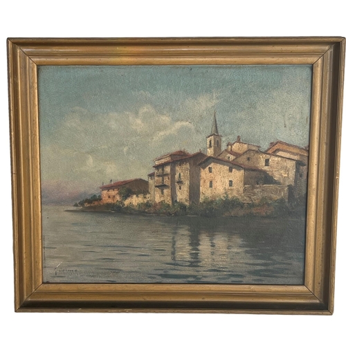 283 - GIOVANNI COLMO, ITALIAN, 1867 - 1947, 20TH CENTURY OIL ON BOARD
Italian river landscape, with church... 