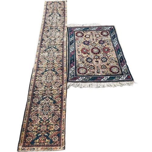 226 - TWO ANTIQUE CARPETS/RUGS
To include a Kuba with stylised motifs and a runner with central diamond mo... 