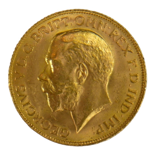 43 - AN EARLY 20TH CENTURY 22CT GOLD SOVEREIGN COIN, DATED 1911
With King George V bust and George and Dr... 