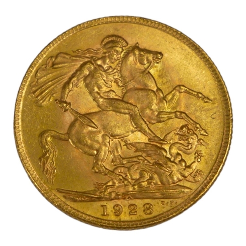 62 - AN EARLY 20TH CENTURY 22CT GOLD SOVEREIGN COIN, DATED 1928 
With King George V bust and George and D... 