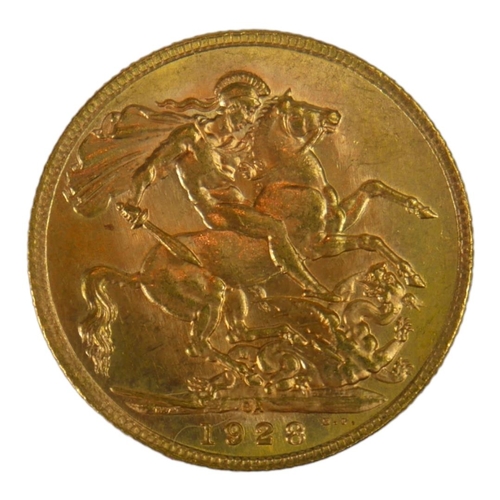 64 - AN EARLY 20TH CENTURY 22CT GOLD SOVEREIGN COIN, DATED 1928 
With King George V bust and George and D... 