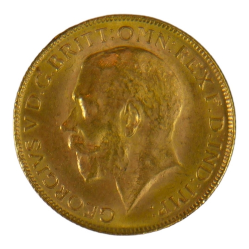 64 - AN EARLY 20TH CENTURY 22CT GOLD SOVEREIGN COIN, DATED 1928 
With King George V bust and George and D... 