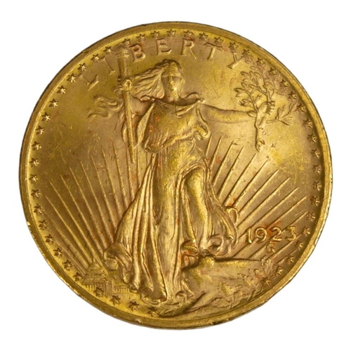 66 - AN EARLY 20TH CENTURY AMERICAN 22CT GOLD TWENTY DOLLAR COIN, DATED 1923 
With St. Gaudens figure and... 