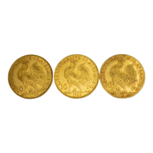 75 - A COLLECTION OF THREE 19TH CENTURY FRENCH 22ct GOLD TEN FRANC COINS, DATED 1907, 1900 AND 1900 
Répu... 