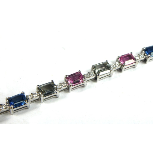 78B - AN 18CT WHITE GOLD BRACELET SET WITH OCTAGONAL MIXED CUT NATURAL FANCY SAPPHIRES AND DIAMONDS, with ... 