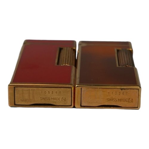 80 - DUNHILL, TWO VINTAGE GOLD PLATE AND ENAMEL CIGARETTE LIGHTERS
Rouge and brown enamel marked ‘105311’... 