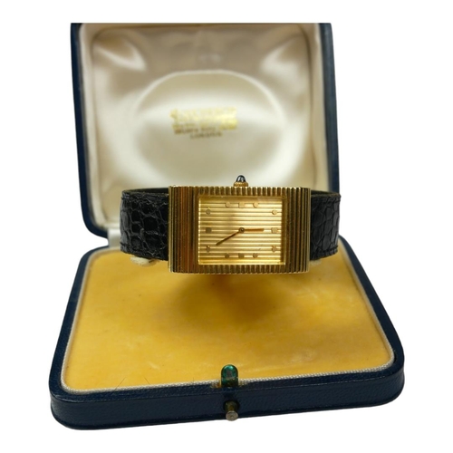 85 - BOUCHERON, A VINTAGE 18CT GOLD DRESS WATCH
The rectangular with horizontal lines to case, textured d... 