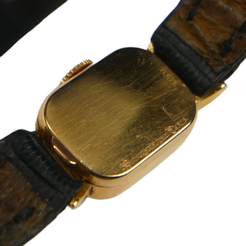 86 - BOUCHERON, A VINTAGE 18CT GOLD LADIES’ COCKTAIL WATCH
The rectangular form with gold tone textured d... 